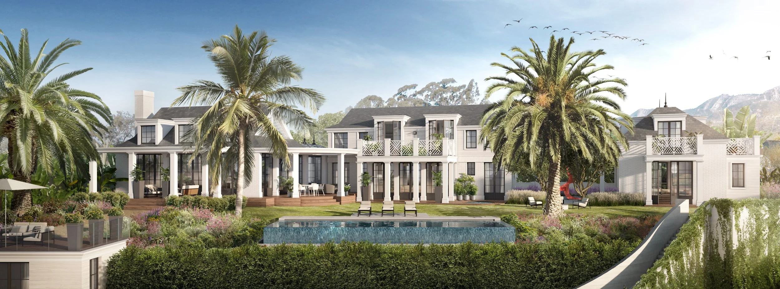 Rear view of the Edgecliff Residence featuring a spacious lawn, an outdoor pool, lush landscaping, and palm trees, highlighting the coastal luxury design by The Warner Group Architects.